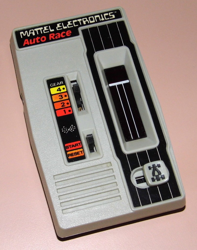 mattel_electronics_auto_race2c_no-_98792c_red_led2c_made_in_hong_kong2c_copyright_1976_led_handheld_electronic_game